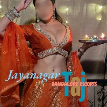 In this photo a girl is wearing lehenga choli and inspiring call girl in jayanagar