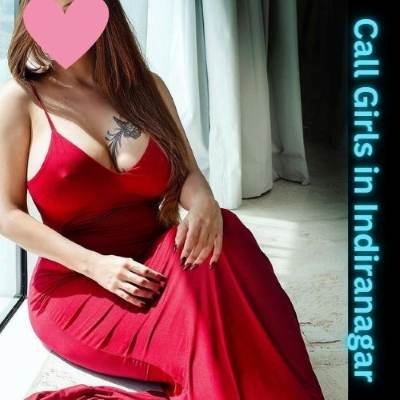 Elite Indiranagar escort models posing near a luxury sports car in Btm Bangalore
