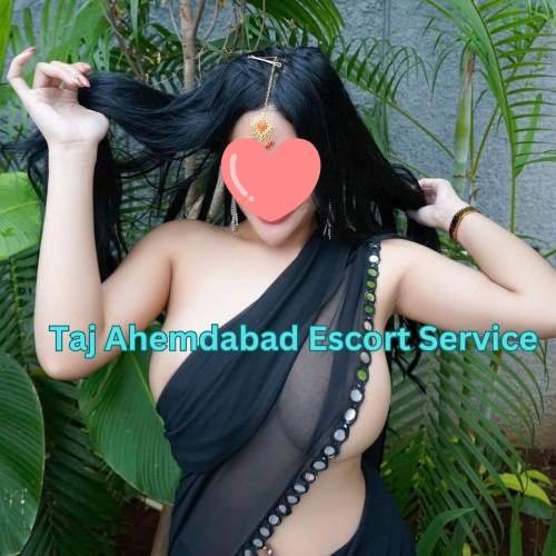 A Girl Wearing Black Saree Tell About Taj Ahemdabad Escort Service